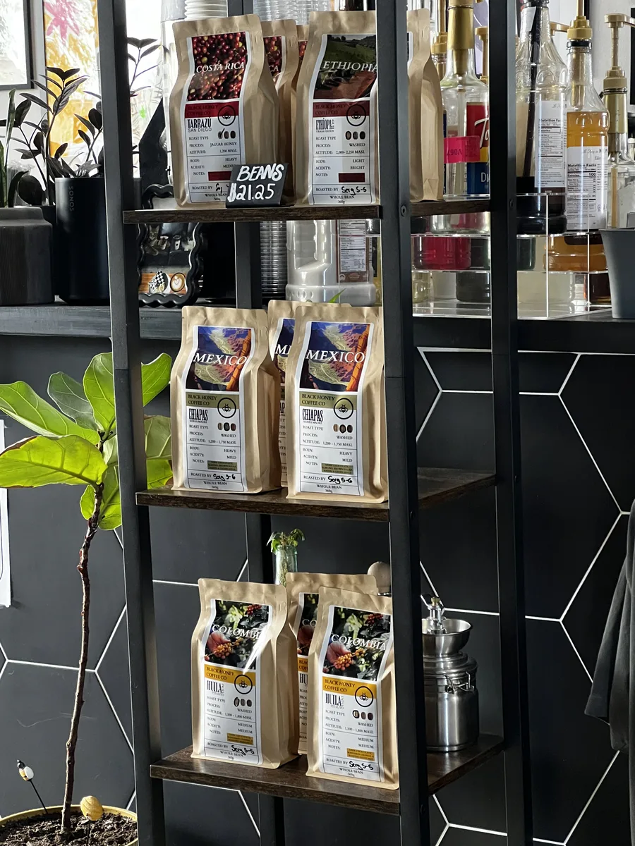 Bags of Black Honey single-origin coffee on the shelf